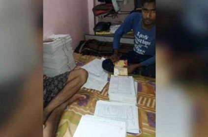 Students seen correcting answer papers, probe ordered