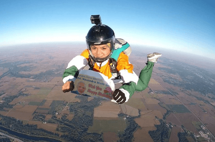 woman jumps from plane to wish PM Modi on his birthday