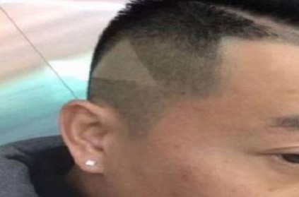 barber shaves \'play button\' on customer\'s head after watching YouTube