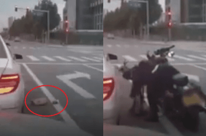 Biker tosses garbage back into car in China
