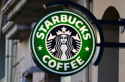 Starbucks apologizes over arrest of two black men.