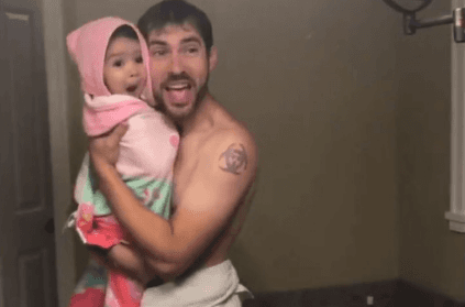 Video of baby lip syncing to song with her dad is too cute to handle
